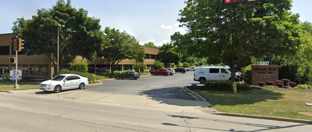 Image of an Equus office building in Wisconsin, surrounded by trees