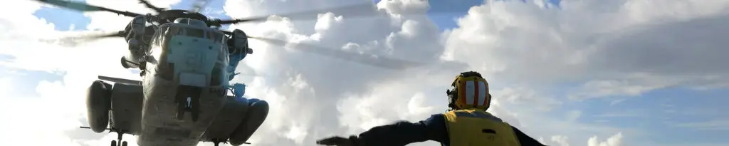 service man watching a helicopter
